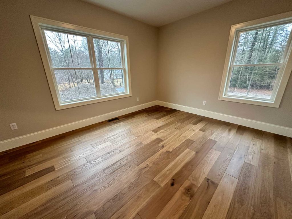 Office with wood flooring
